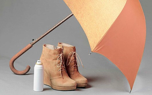 imagen botas y paraguas